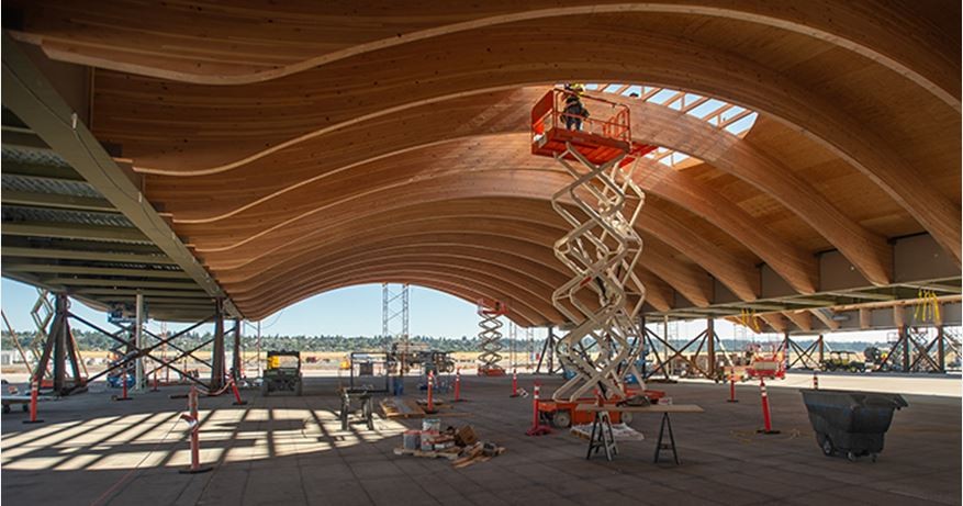 Workers-are-assembling-a-roof-for-a-new-main-terminal-at-Portland-International-Airport